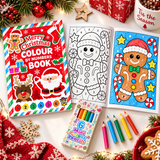 A festive Christmas coloring book set displayed on a white surface with holiday decorations. The set includes a red 'Merry Christmas Colour by Numbers Book' cover, an open black-and-white gingerbread man coloring page, a blue-colored gingerbread man page, a box of '6 Mini Colour Pencils', and colored pencils.