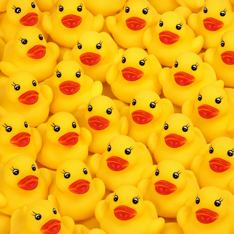 Pattern of yellow rubber ducks with red beaks and black eyes.