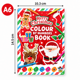 A festive A6 size Christmas colour by numbers book shown front-facing with dimension labels. The cover is bright red with striped border elements, holiday illustrations including Santa Claus, a reindeer, gingerbread man, stocking, gifts, holly, and pine branches, and numbered color circles along the bottom.