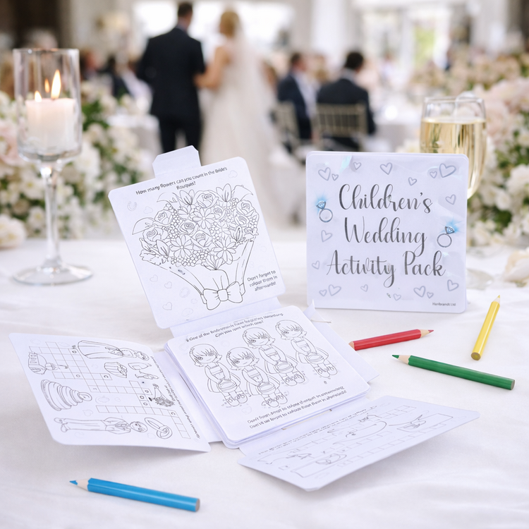 Children's wedding activity pack on a table with wedding guests in the background