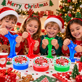 Four children wearing Santa hats and holiday headbands are smiling and stretching colorful slime at a Christmas-themed table. Three tubs of Christmas-themed slime are visible in the foreground, with a decorated Christmas tree, ornaments, and a 'Merry Christmas' banner in the background.