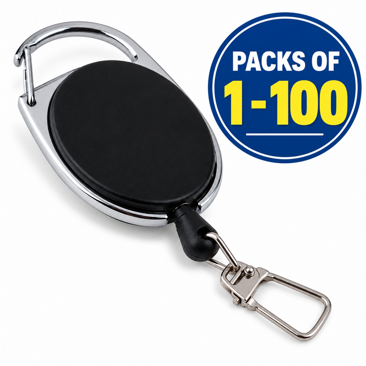 A retractable badge reel keychain with a black oval face, silver metal frame and clips, shown on a white background with a blue circular badge that reads 'PACKS OF 1-100'.