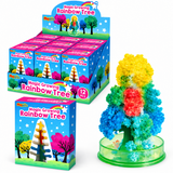Magic growing rainbow tree toy set with a colorful rainbow tree on a green base, shown alongside retail packaging boxes on a white background.