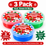 Three plastic tubs of Christmas-themed slime in red, green, and blue, arranged together on a white background with promotional text reading '3 Pack', 'Red, Green & Blue', '3 Festive Colours', and 'Stretch Squish Play'.