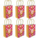 Set of five small gift bags with pink floral patterns and gold ribbons on a white background