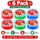 Six plastic tubs of Christmas-themed slime arranged in a 2x3 grid on a white background, with a red '6 Pack' banner at the top and feature icons at the bottom. The tubs are red, green, and blue, each labeled 'Glorious Christmas Slime'.