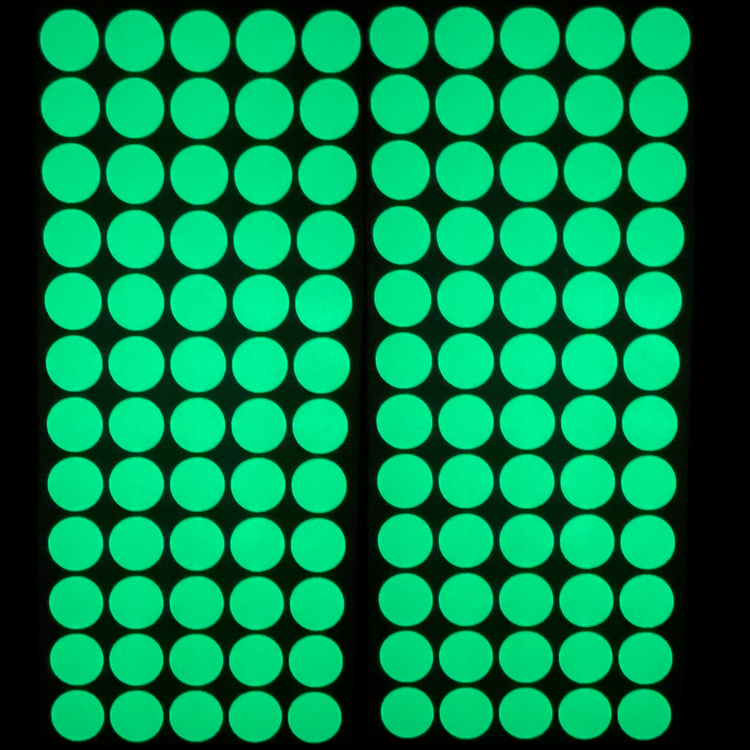 Grid of green circles on a black background