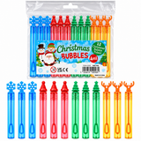 Pack of 12 Christmas-themed bubble wands in a clear plastic bag with a printed holiday label, plus six loose bubble wands displayed below on a white background. The wands come in blue snowflake, red tree-top, green tree-shaped, and orange reindeer antler designs.