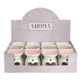 Display box of ceramic products with 'Aroma' branding on a white background