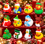 Twelve colorful Christmas-themed rubber ducks arranged on red velvet steps with festive decorations, including Santa, holiday trees, snowman, penguin, reindeer, and other holiday designs.
