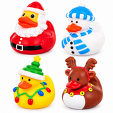 Four Christmas-themed rubber duckies arranged in a 2x2 grid on a white background: Santa Claus, a snowman, a yellow duck with a Christmas tree hat and colorful string lights, and a brown reindeer with antlers and a red collar.
