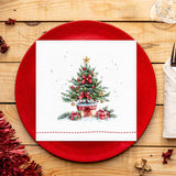 Christmas card with a decorated tree and presents on a red plate with a wooden background.