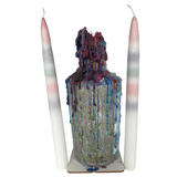 Rainbow drip candles meltesd on bottle