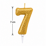 A gold glitter number 7 birthday candle with a white wick and base, shown on a white background with a height measurement of 7 cm indicated on the left.