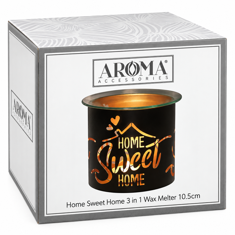 A boxed wax melt product from Aroma Accessories. The white and gray retail box shows a printed image of the black cylindrical wax melt container with gold lettering that reads 'Home Sweet Home' and a gold wax pool at the top.