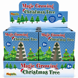 A retail display box filled with individual packages of PlayWrite Magic Growing Christmas Tree toys, shown against a plain white background.