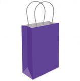 Purple paper bag with white handles on a white background