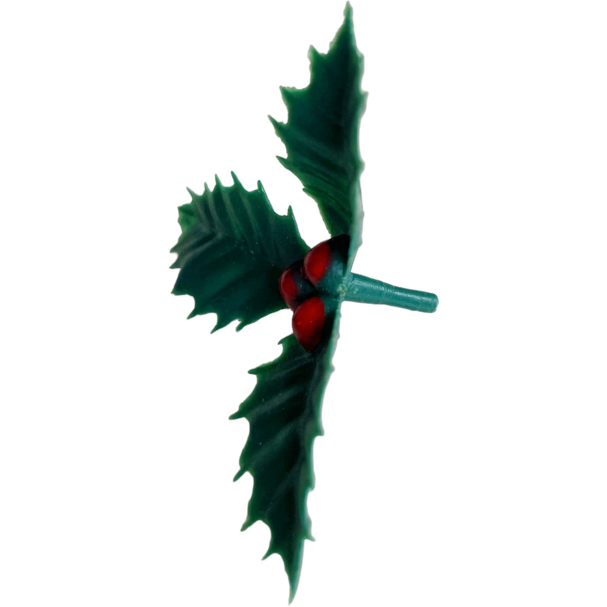 side view of holly and berry christmas cake topper