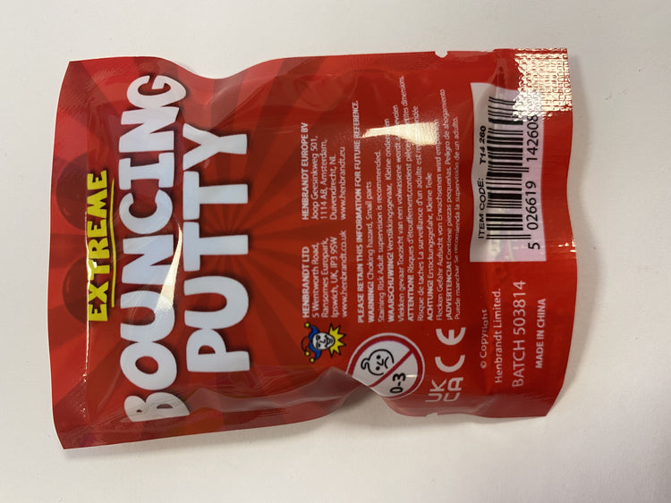 Red package of Extreme Bouncing Putty with text and a barcode on a white background