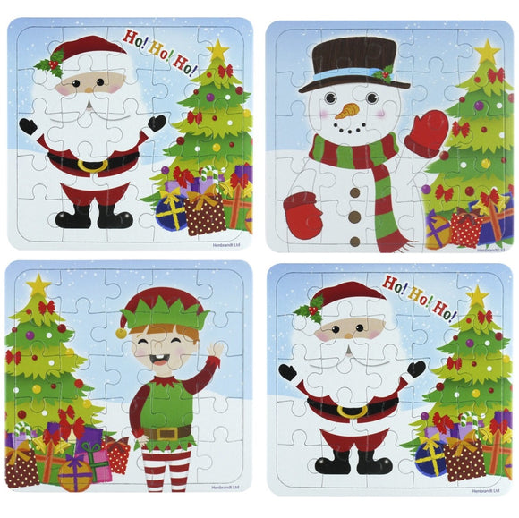 Set of four Christmas-themed children's puzzles featuring Santa, snowman, and elf.