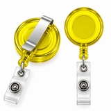 Two retractable badge reel accessories shown on a white background, one from the front and one from the back. The reels are bright translucent yellow with a silver metal clip, and the attached badge holder is clear plastic with a silver metal snap button.