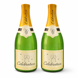 Two inflatable bottles of 'Celebration' wine with green bodies and gold caps on a white background.