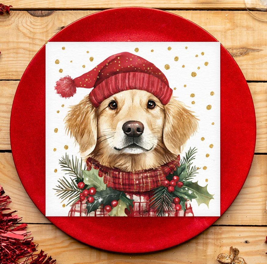Christmas-themed plate with a dog illustration wearing a red hat and scarf on a paper napkin.