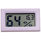 white digital humidity meter