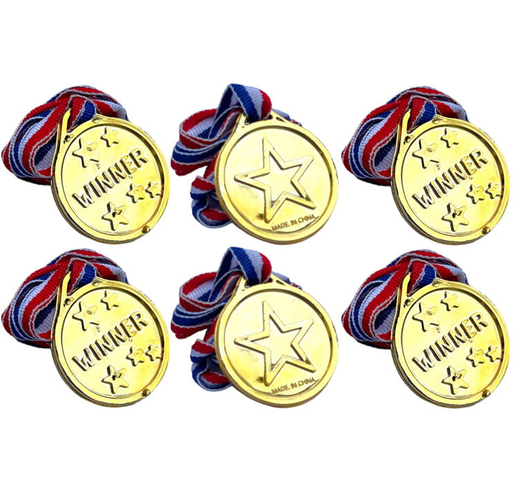 Gold medals with ribbons on a white background
