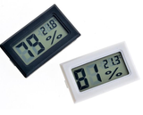 black and white digistl temperature humidity meters
