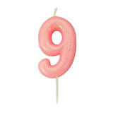 number 9 pink cake candle