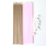 Extra long gold and pink cake candles 18cm tall